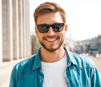 portrait-handsome-smiling-stylish-hipster-lumbersexual-businessman-model-man-dressed-jeans-jacket-clothes