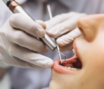 dentist treating periodontal disease
